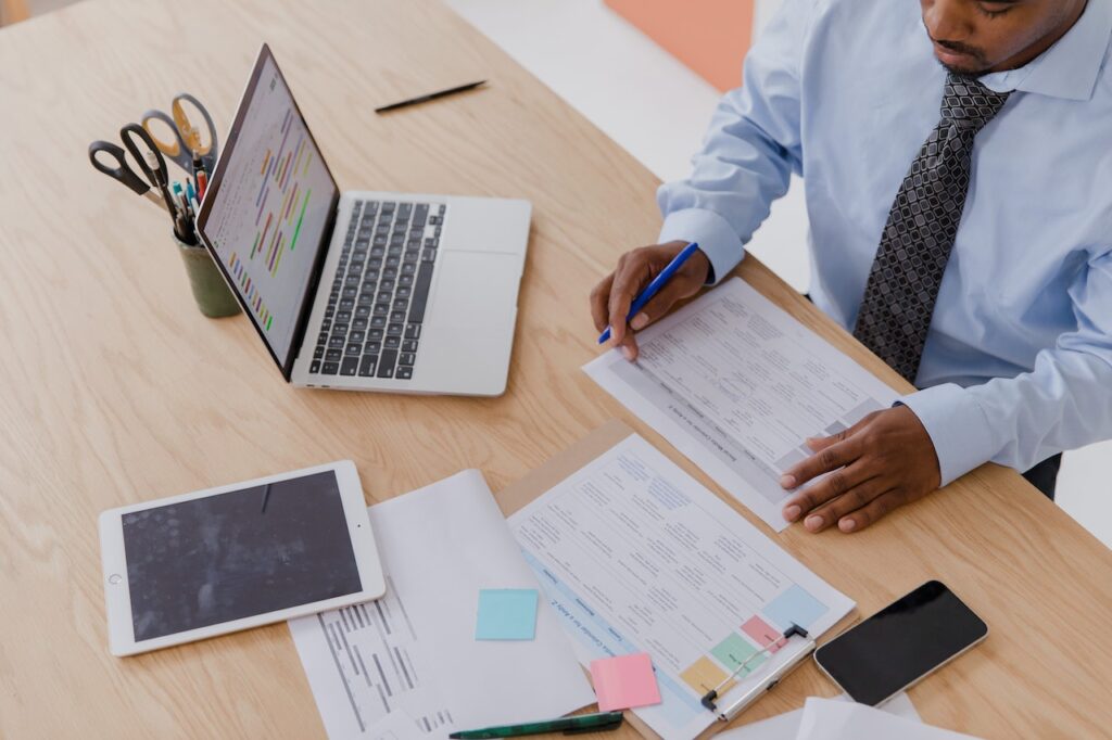 A person balancing salary and dividends for maximum tax efficiency
